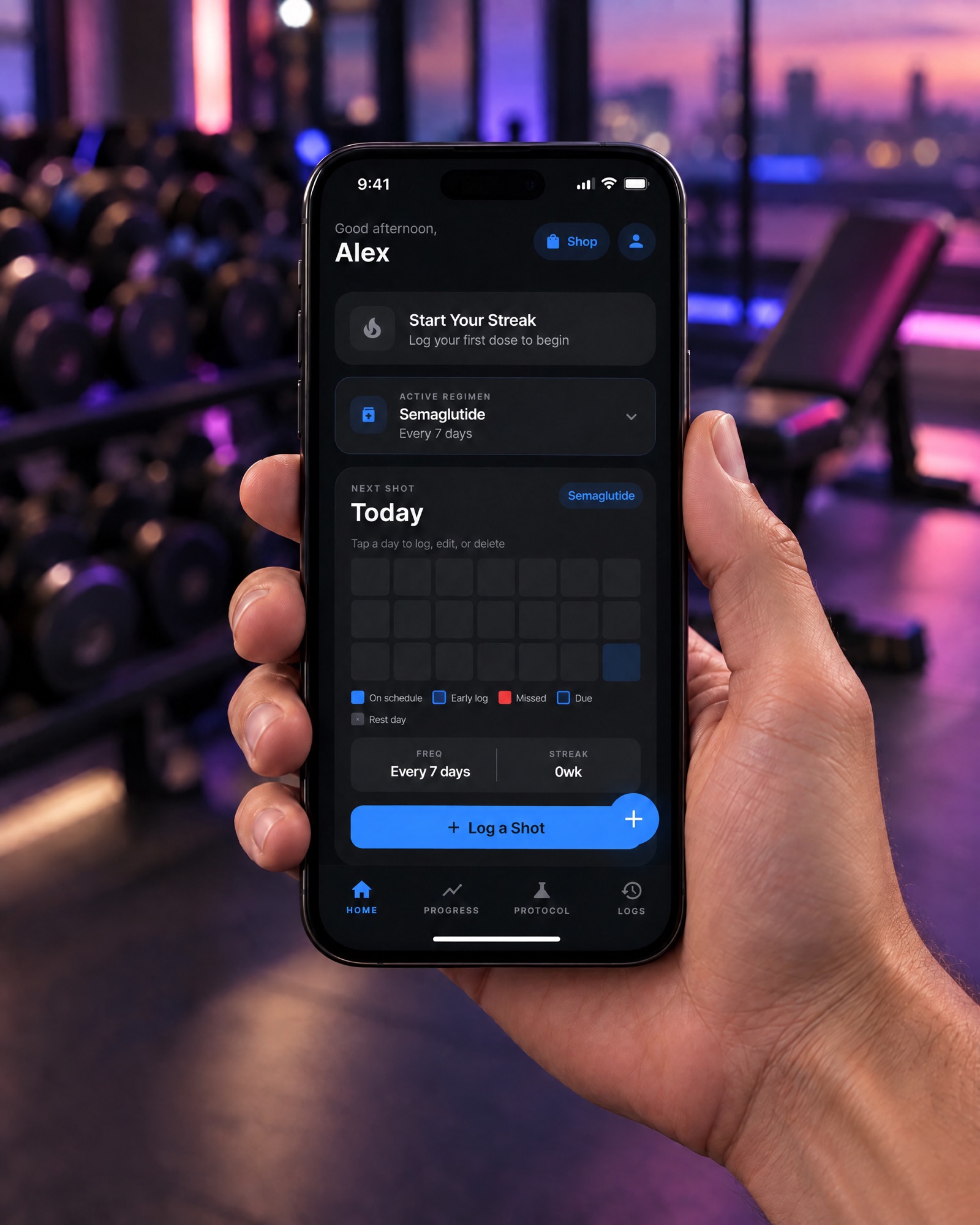 Holding an iPhone with the PepPal home screen open at the gym